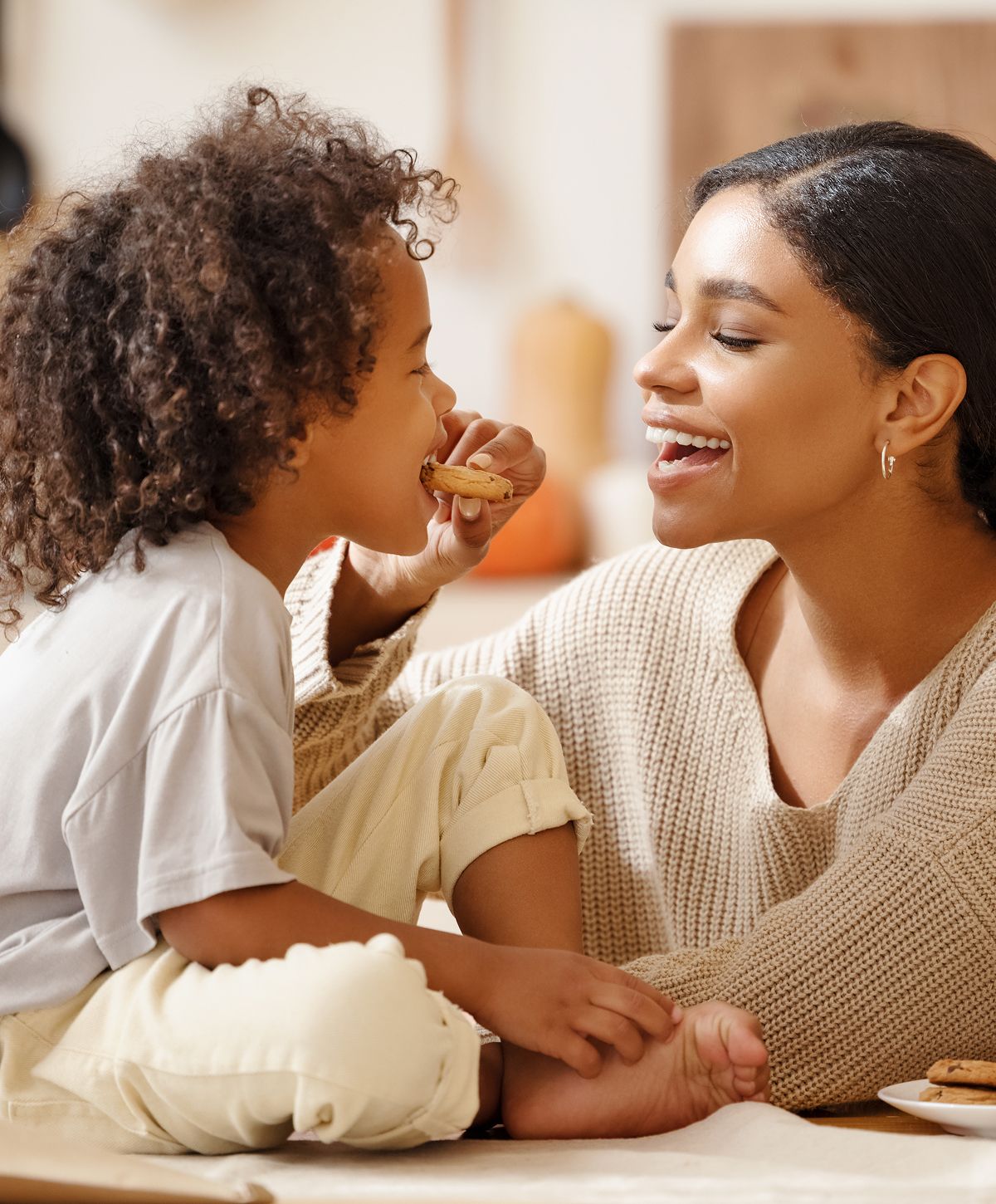 Smiling woman in activewear enjoying the outdoors.
