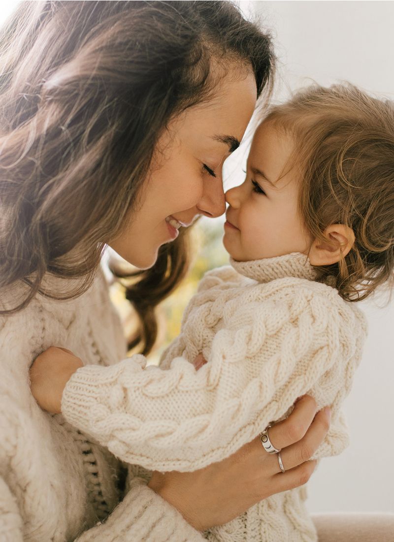Mother and child sharing a tender moment.